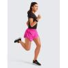 imageCRZ YOGA Mid Waisted Dolphin Athletic Shorts for Women 4quot Lightweight High Split for Gym Workout with Liner Quick DryHibiscus Purple
