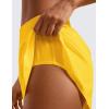 imageCRZ YOGA Mid Waisted Dolphin Athletic Shorts for Women 4quot Lightweight High Split for Gym Workout with Liner Quick DryHigh Visibility Yellow