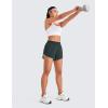 imageCRZ YOGA Mid Waisted Dolphin Athletic Shorts for Women 4quot Lightweight High Split for Gym Workout with Liner Quick DryMelanite