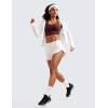 imageCRZ YOGA Mid Waisted Dolphin Athletic Shorts for Women 4quot Lightweight High Split for Gym Workout with Liner Quick DryMilky White Bone