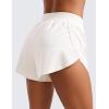 imageCRZ YOGA Mid Waisted Dolphin Athletic Shorts for Women 4quot Lightweight High Split for Gym Workout with Liner Quick DryMilky White Bone