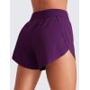 imageCRZ YOGA Mid Waisted Dolphin Athletic Shorts for Women 4quot Lightweight High Split for Gym Workout with Liner Quick DryPlum Magenta