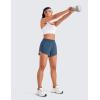 imageCRZ YOGA Mid Waisted Dolphin Athletic Shorts for Women 4quot Lightweight High Split for Gym Workout with Liner Quick DryStelindigo