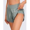 imageCRZ YOGA Mid Waisted Dolphin Athletic Shorts for Women 4quot Lightweight High Split for Gym Workout with Liner Quick DrySterling