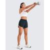 imageCRZ YOGA Mid Waisted Dolphin Athletic Shorts for Women 4quot Lightweight High Split for Gym Workout with Liner Quick DryTrue Navy