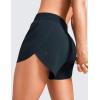 imageCRZ YOGA Mid Waisted Dolphin Athletic Shorts for Women 4quot Lightweight High Split for Gym Workout with Liner Quick DryTrue Navy