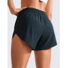 imageCRZ YOGA Mid Waisted Dolphin Athletic Shorts for Women 4quot Lightweight High Split for Gym Workout with Liner Quick DryTrue Navy