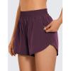 imageCRZ YOGA Womens High Waisted Running Shorts Mesh Liner 3 Dolphin Quick Dry for Athletic Gym Track Workout with Zip PocketArctic Plum