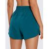 imageCRZ YOGA Womens High Waisted Running Shorts Mesh Liner 3 Dolphin Quick Dry for Athletic Gym Track Workout with Zip PocketBorealis Green