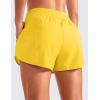 imageCRZ YOGA Womens High Waisted Running Shorts Mesh Liner 3 Dolphin Quick Dry for Athletic Gym Track Workout with Zip PocketHigh Visibility Yellow