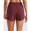 imageCRZ YOGA Womens High Waisted Running Shorts Mesh Liner 3 Dolphin Quick Dry for Athletic Gym Track Workout with Zip PocketRed Merlot
