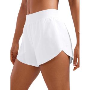imageCRZ YOGA Mid Waisted Dolphin Athletic Shorts for Women 4quot Lightweight High Split for Gym Workout with Liner Quick DryWhite