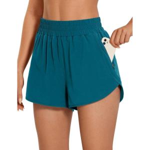 imageCRZ YOGA Womens High Waisted Running Shorts Mesh Liner 3 Dolphin Quick Dry for Athletic Gym Track Workout with Zip PocketBorealis Green