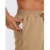 imageCRZ YOGA Mens Linerless Workout Shorts  5 Lightweight Quick Dry for Running Sports Athletic Gym with PocketsKhaki Sand