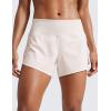 imageCRZ YOGA Mid Waisted Running Shorts for Women 4quot Soft for Gym Athletic Workout with Zipper Pocket Liner Quick DryMilky White Bone