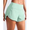 imageCRZ YOGA Mid Waisted Running Shorts for Women 4quot Soft for Gym Athletic Workout with Zipper Pocket Liner Quick DryMint Moment