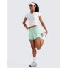imageCRZ YOGA Womens Mid Waisted Running Shorts Liner  5 Quick Dry for Athletic Sport Workout Track with Zip PocketMint Moment