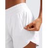 imageCRZ YOGA Womens Mid Waisted Running Shorts Liner  5 Quick Dry for Athletic Sport Workout Track with Zip PocketWhite