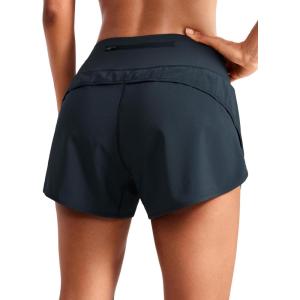 imageCRZ YOGA Mid Waisted Running Shorts for Women 4quot Soft for Gym Athletic Workout with Zipper Pocket Liner Quick DryTrue Navy