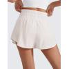 imageCRZ YOGA Athletic Shorts for Women High Waisted Flowy Ruffle Skirt Overlay for Workout Running Tennis with Zip PocketMilky White Bone