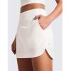 imageCRZ YOGA High Waisted Golf Skirts for Women A Line Tennis Athletic Casual Skort with Inner Shorts PocketsMilky White Bone