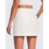 imageCRZ YOGA High Waisted Golf Skirts for Women A Line Tennis Athletic Casual Skort with Inner Shorts PocketsMilky White Bone