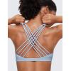 imageCRZ YOGA Strappy Sports Bras for Women  Criss Cross Back Wireless Padded Yoga Workout Cami TopCambric Blue