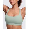 imageCRZ YOGA Strappy Sports Bras for Women  Criss Cross Back Wireless Padded Yoga Workout Cami TopGreen Palm Court