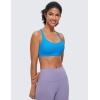 imageCRZ YOGA Strappy Sports Bras for Women  Criss Cross Back Wireless Padded Yoga Workout Cami TopMadagascar Blue