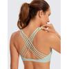 imageCRZ YOGA Strappy Sports Bras for Women  Criss Cross Back Wireless Padded Yoga Workout Cami TopPale Straw Green