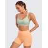 imageCRZ YOGA Strappy Sports Bras for Women  Criss Cross Back Wireless Padded Yoga Workout Cami TopPale Straw Green