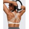 imageCRZ YOGA Strappy Sports Bras for Women  Criss Cross Back Wireless Padded Yoga Workout Cami TopWhite Apricot