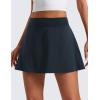 imageCRZ YOGA Tennis Skirt for Women High Waisted Flowy Golf Pickleball Athletic Casual A Line Skorts with PocketsTrue Navy