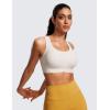 imageCRZ YOGA Womens Flex Sculpt Racerback Sports Bra  U Neck Medium Impact Padded Wireless Workout Gym Crop TopMilky White Bone