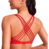 imageCRZ YOGA Strappy Sports Bras for Women  Criss Cross Back Wireless Padded Yoga Workout Cami TopDeep Red