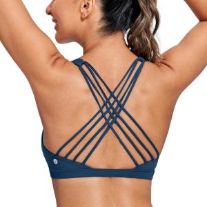 imageCRZ YOGA Strappy Sports Bras for Women  Criss Cross Back Wireless Padded Yoga Workout Cami TopFrench Navy