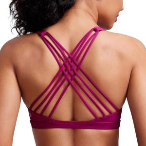 imageCRZ YOGA Strappy Sports Bras for Women  Criss Cross Back Wireless Padded Yoga Workout Cami TopMagenta Purple