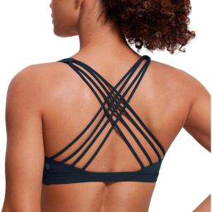 imageCRZ YOGA Strappy Sports Bras for Women  Criss Cross Back Wireless Padded Yoga Workout Cami TopTrue Navy