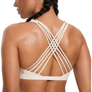 imageCRZ YOGA Strappy Sports Bras for Women  Criss Cross Back Wireless Padded Yoga Workout Cami TopWhite Apricot