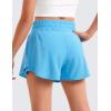 imageCRZ YOGA Girls Athletic Shorts with Zip Pocket  High Waist Flowy Ruffle Skirt for Workout Running Tennis Teen Kids LinerKayak Blue