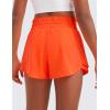 imageCRZ YOGA Girls Athletic Shorts with Zip Pocket  High Waist Flowy Ruffle Skirt for Workout Running Tennis Teen Kids LinerNeon Orange