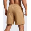 imageCRZ YOGA Mens Linerless Workout Shorts  7 Quick Dry for Running Sports Athletic Gym with PocketsKhaki Sand