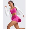 imageCRZ YOGA Tennis Skirts for Women High Waisted Side Slit Running Workout Athletic Mini A Line Skort with PocketsHibiscus Purple