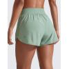 imageCRZ YOGA High Waisted Dolphin Shorts for Women 3 for Running Athletic Workout Gym with Zipper Pockets LinerGreen Palm Court