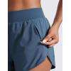 imageCRZ YOGA High Waisted Dolphin Shorts for Women 3 for Running Athletic Workout Gym with Zipper Pockets LinerStelindigo