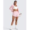 imageCRZ YOGA High Waisted Dolphin Shorts for Women 3 for Running Athletic Workout Gym with Zipper Pockets LinerStrawberry Pink