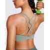 imageCRZ YOGA Womens Butterluxe High Neck Longline Sports Bras  Criss Cross Halter Wireless Padded Gym Workout Crop TopGreen Palm Court
