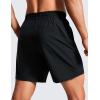 imageCRZ YOGA Casual Workout Mens Shorts 7 Inch Lightweight Quick Dry for Gym Athletic with Zipper PocketBlack