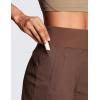 imageCRZ YOGA Womens Lightweight Mid Rise Hiking Shorts 4  Stretch for Athletic Summer Travel Outdoor Golf with Zip PocketsCoffee Brown