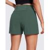 imageCRZ YOGA Womens Lightweight Mid Rise Hiking Shorts 4  Stretch for Athletic Summer Travel Outdoor Golf with Zip PocketsDark Forest Green